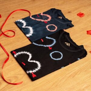 Not Your Basic Tee! Grab the Handcrafted Cupid Tie-Dye Shirt before they’re gone. Unique. Bold. Unforgettable. Shop the Look!