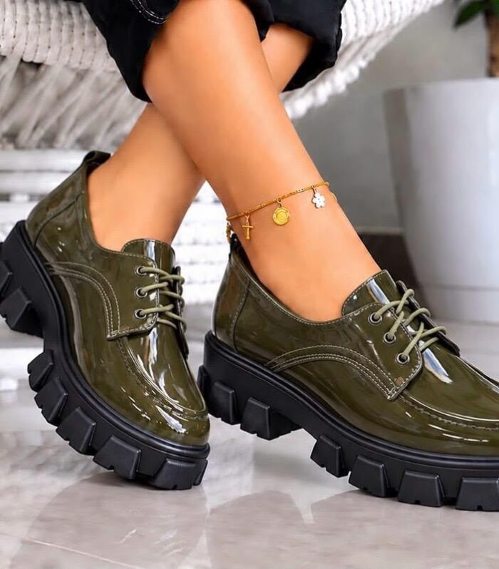 Step up your shoe game with these stylish olive green patent leather platform loafers! Designed with a high-shine glossy finish, these Oxford-style lace-up shoes blend edgy street style with everyday comfort. The deep tread lug sole gives you extra height, steady grip, and a bold look that turns heads wherever you go.